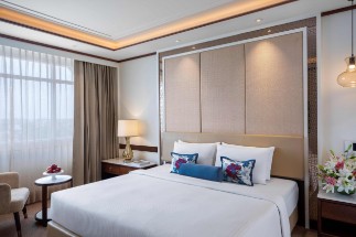 Deluxe Room at Tajview, Agra Deluxe room with a king-sized bed at Tajview, Agra - IHCL SeleQtions, a top hotel in Taj Ganj.