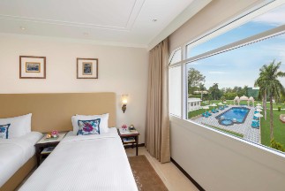 Deluxe Room with Twin Beds at Tajview, Agra Deluxe room with twin beds at Tajview, Agra - IHCL SeleQtions, a 5-star hotel near Taj Mahal.