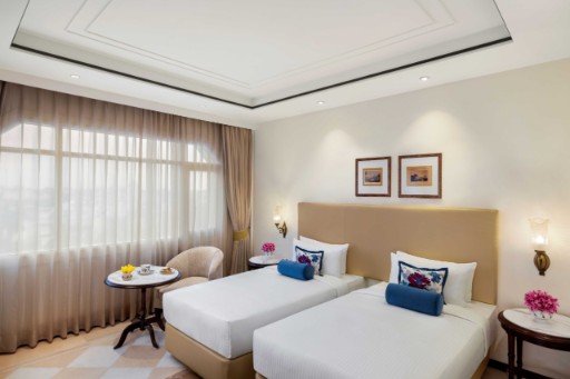 Deluxe Room with Twin Beds at Tajview, Agra Deluxe room with twin beds at Tajview, Agra - IHCL SeleQtions, a 5-star hotel near Taj Mahal.