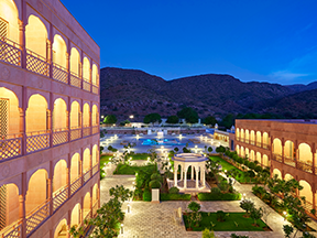 View of Pratap Mahal Night view of Pratap Mahal, a luxury hotel in Ajmer, with beautifully lit gardens and architecture.