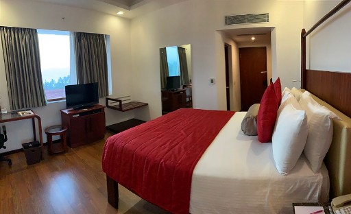 Luxurious Bedroom - Gateway Varkala Luxurious bedroom at Gateway Varkala, offering modern amenities and stylish decor for a comfortable stay in this 5-star hotel in Varkala.