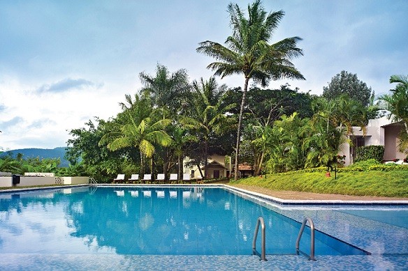 Pool Area at Gateway Chikmagalur Comfortable pool area at Gateway Chikmagalur, providing a relaxing environment for business travelers