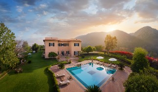 Aerial View of the Pool at Ramgarh Lodge, IHCL SeleQtions Aerial view of the swimming pool in the morning at Ramgarh Lodge, IHCL SeleQtions, a 5-star hotel near Jaipur.