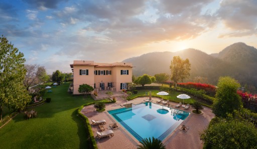 Aerial View of the Pool at Ramgarh Lodge, IHCL SeleQtions Aerial view of the swimming pool in the morning at Ramgarh Lodge, IHCL SeleQtions, a 5-star hotel near Jaipur.