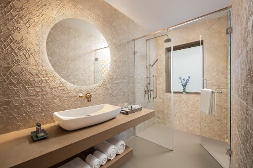 Deluxe Room Bathroom - The Yellow House Goa Bathroom in deluxe rooms at The Yellow House, Goa, showcasing elegant design and modern amenities.