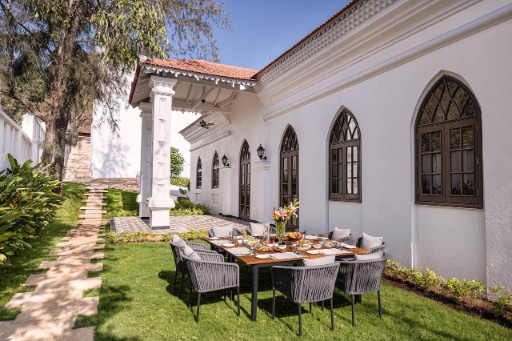 Outdoor Dining at The Yellow House Goa Outdoor dining area at The Yellow House, Goa, providing a scenic and relaxing dining experience. Ideal for private dining in Anjuna.