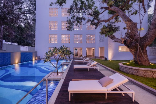 Pool at Night - The Yellow House Goa Night view of the pool at The Yellow House, Goa, highlighting the serene and inviting ambiance for evening relaxation.