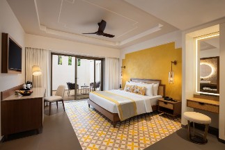 Premium Room with Plunge Pool - The Yellow House Goa Premium room with plunge pool at The Yellow House, Goa, offering a luxurious experience with a private plunge pool.