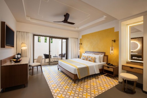 Premium Room with Plunge Pool - The Yellow House Goa Premium room with plunge pool at The Yellow House, Goa, offering a luxurious experience with a private plunge pool.